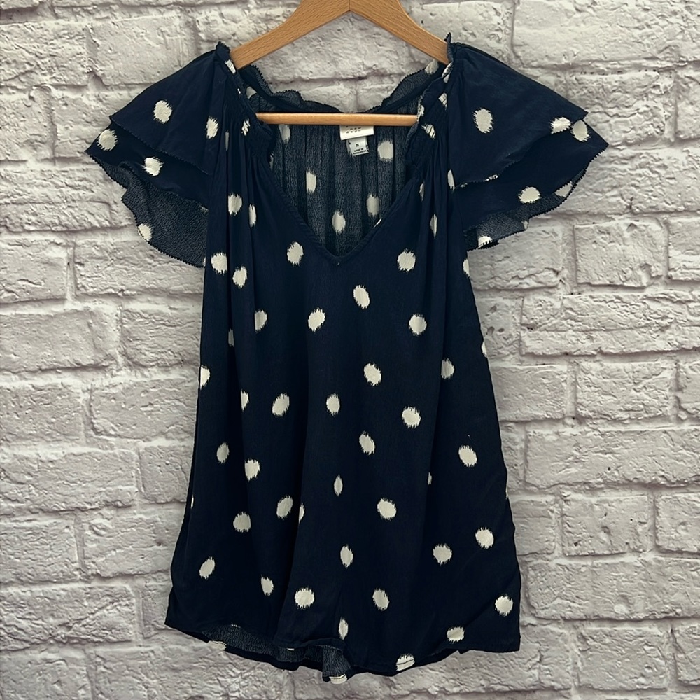 Women’s navy and white polka dot blouse